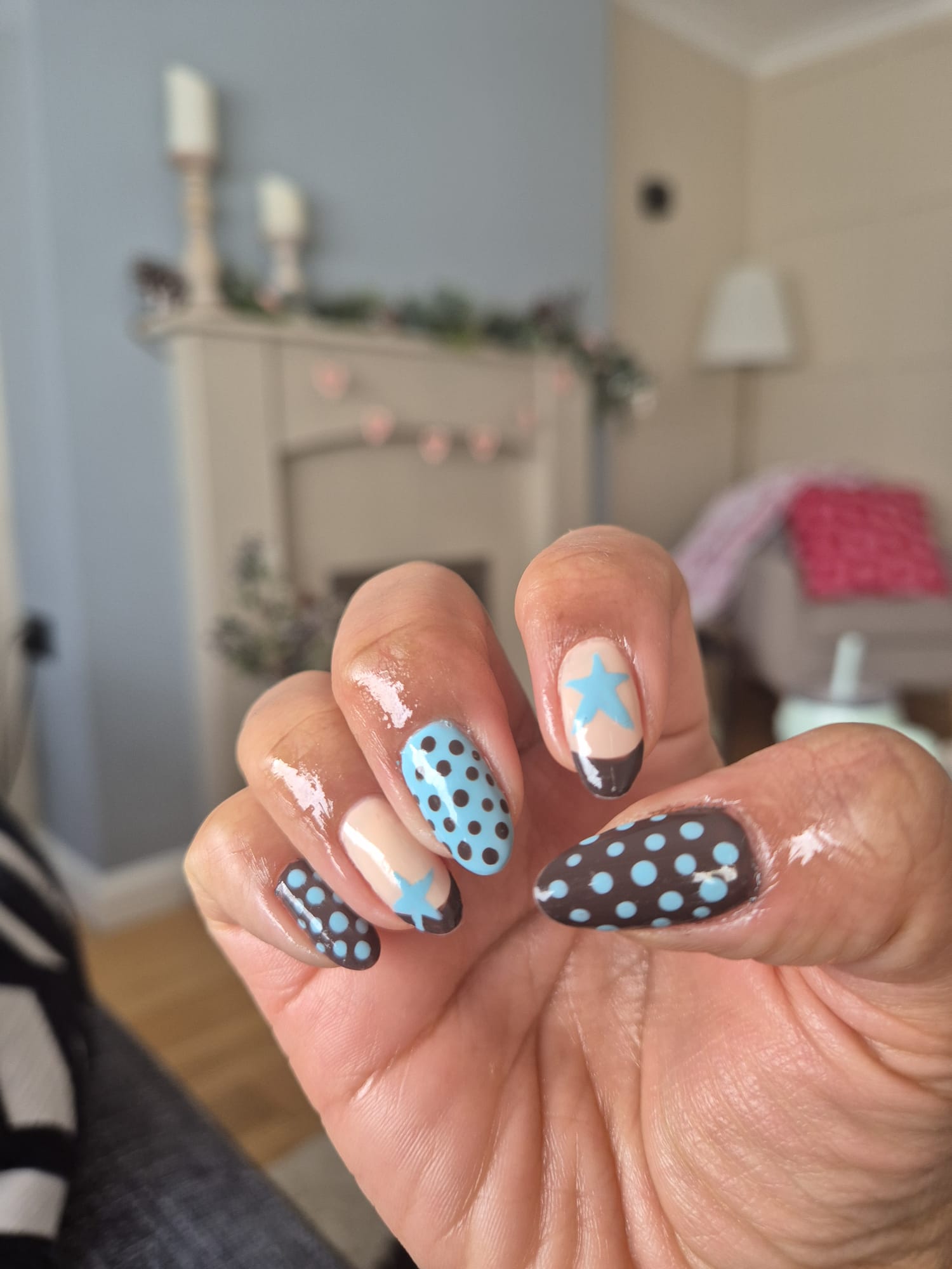 Brown and blue polka dot nails with star french tips