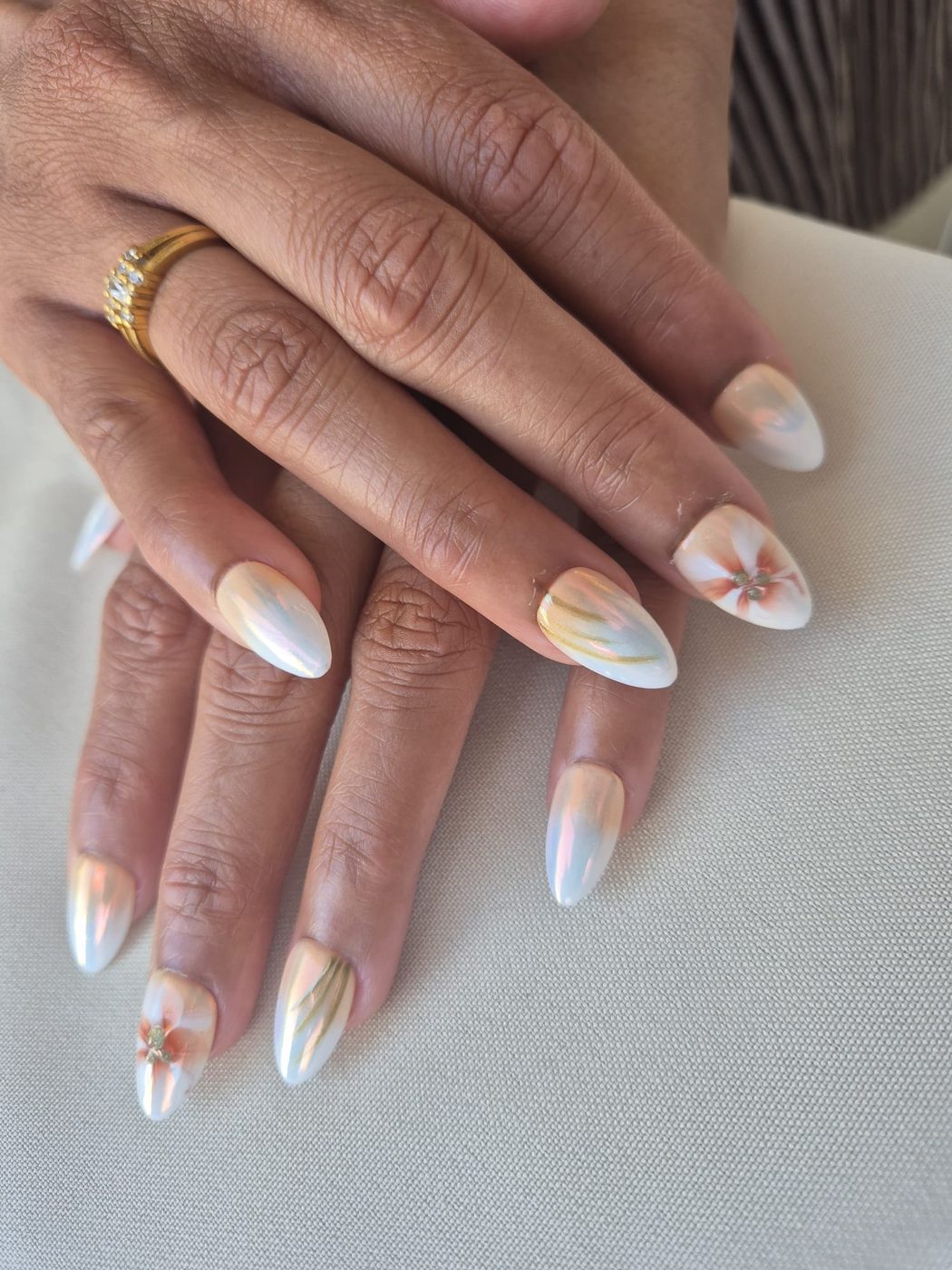Pearl chrome press-on nails with peach blossoms