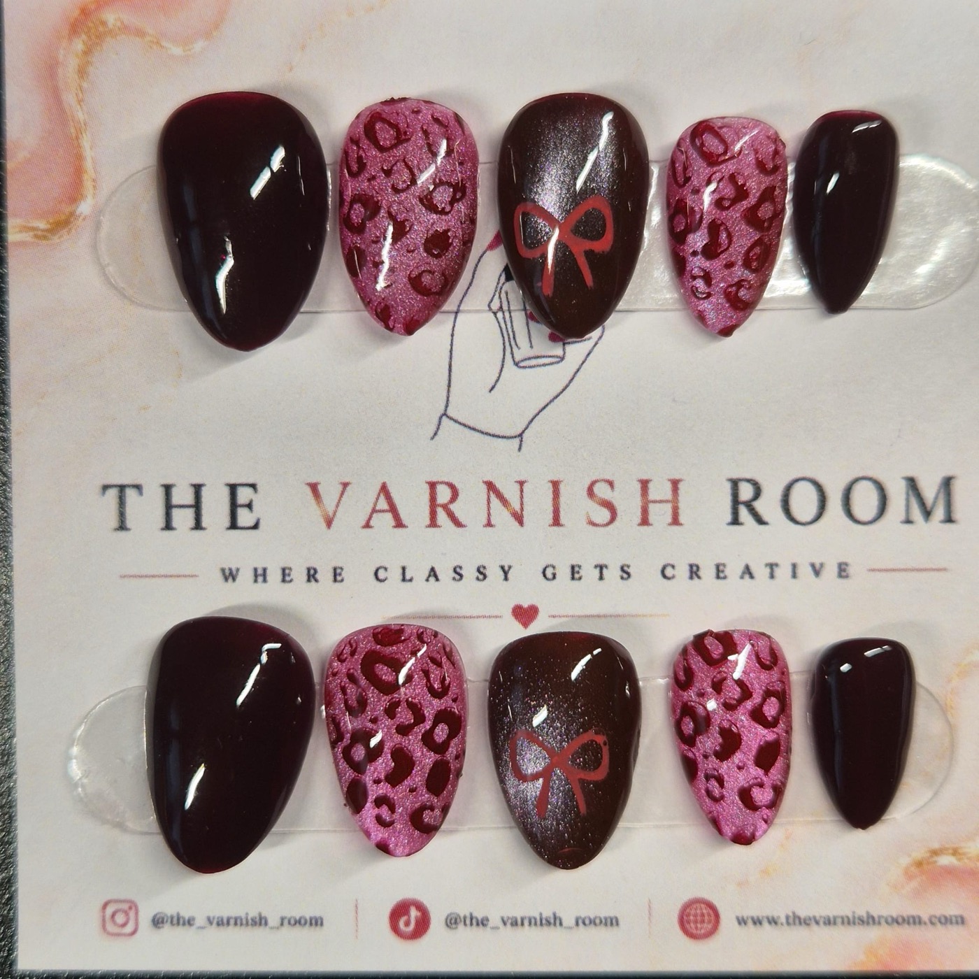 Wild Bow — hand-painted press-on nail set by The Varnish Room